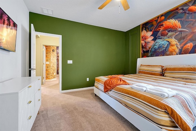 3860 Sonoma Blvd, Kissimmee, FL 34741 - bedroom featuring light colored carpet, baseboards, and ceiling fan