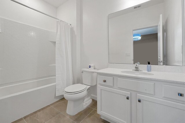 3860 Sonoma Blvd, Kissimmee, FL 34741 - bathroom with vanity, toilet, tile patterned flooring, and shower / bathtub combination with curtain