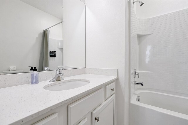 3860 Sonoma Blvd, Kissimmee, FL 34741 - bathroom with vanity and shower / bath combo with shower curtain