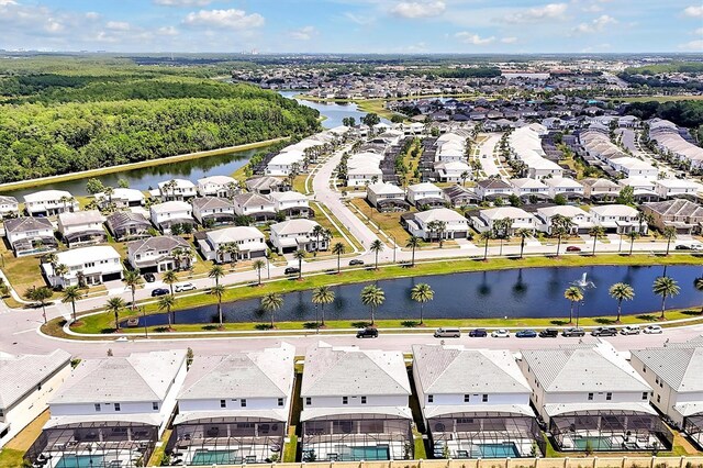 3860 Sonoma Blvd, Kissimmee, FL 34741 - aerial perspective of suburban area with a large body of water