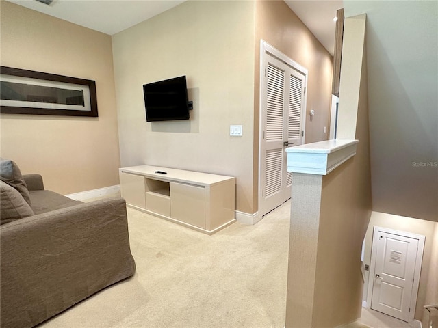 7667 Recife Dr, Kissimmee, FL 34747 - living area featuring light carpet and baseboards