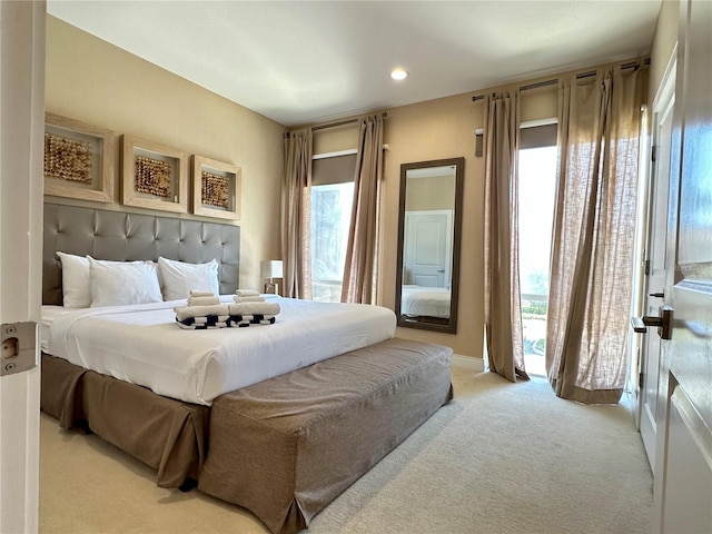 7667 Recife Dr, Kissimmee, FL 34747 - bedroom with light colored carpet, recessed lighting, and baseboards