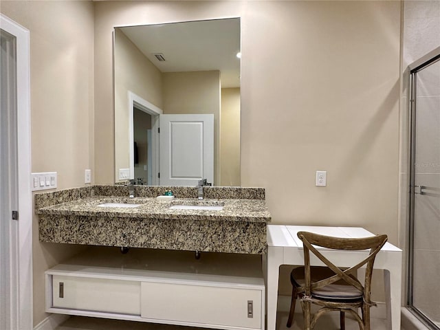 7667 Recife Dr, Kissimmee, FL 34747 - bathroom featuring an enclosed shower, double vanity, and a tub