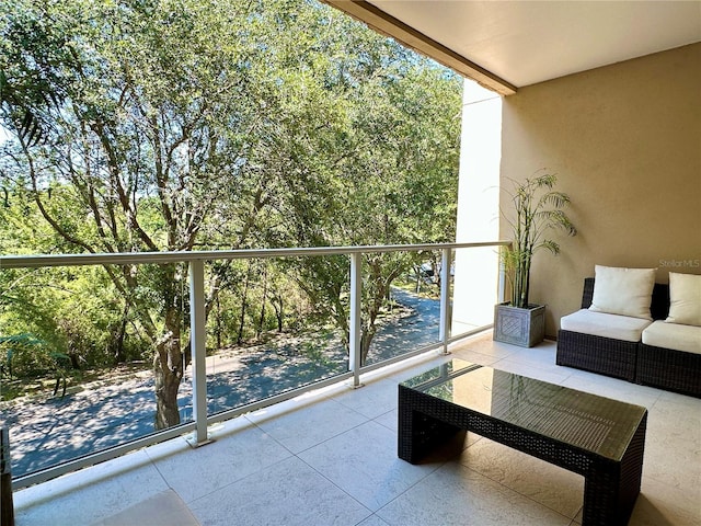 7667 Recife Dr, Kissimmee, FL 34747 - balcony with outdoor lounge area