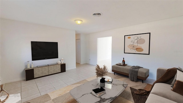 1119 Edith Dr, Daytona Beach, FL 32117 - living room with light tile patterned floors and baseboards