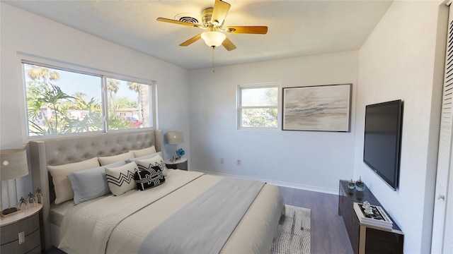 1119 Edith Dr, Daytona Beach, FL 32117 - bedroom featuring wood finished floors and a ceiling fan