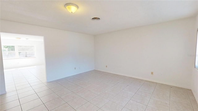 1119 Edith Dr, Daytona Beach, FL 32117 - unfurnished room with light tile patterned flooring