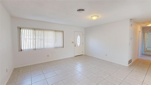 1119 Edith Dr, Daytona Beach, FL 32117 - foyer featuring light tile patterned floors