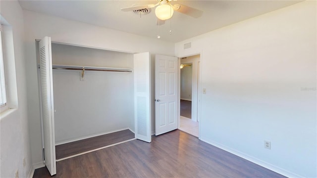 1119 Edith Dr, Daytona Beach, FL 32117 - unfurnished bedroom featuring wood finished floors, a closet, and a ceiling fan