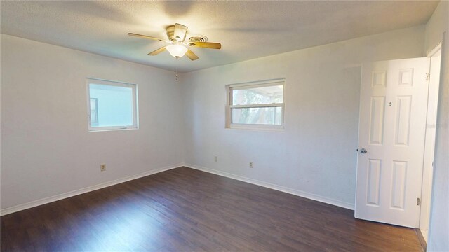 1119 Edith Dr, Daytona Beach, FL 32117 - empty room with dark wood-style flooring and a ceiling fan