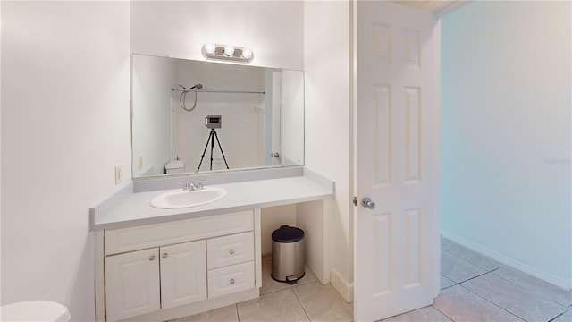 1119 Edith Dr, Daytona Beach, FL 32117 - bathroom with tile patterned flooring and vanity