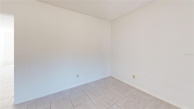 1119 Edith Dr, Daytona Beach, FL 32117 - spare room featuring light tile patterned floors