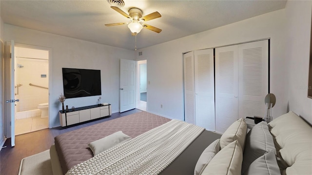 1119 Edith Dr, Daytona Beach, FL 32117 - bedroom with a closet, a ceiling fan, and connected bathroom