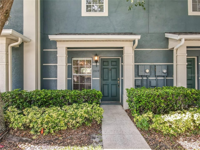 3309 Wilshire Way Rd Unit 3, Orlando, FL 32829 - view of exterior entry featuring stucco siding