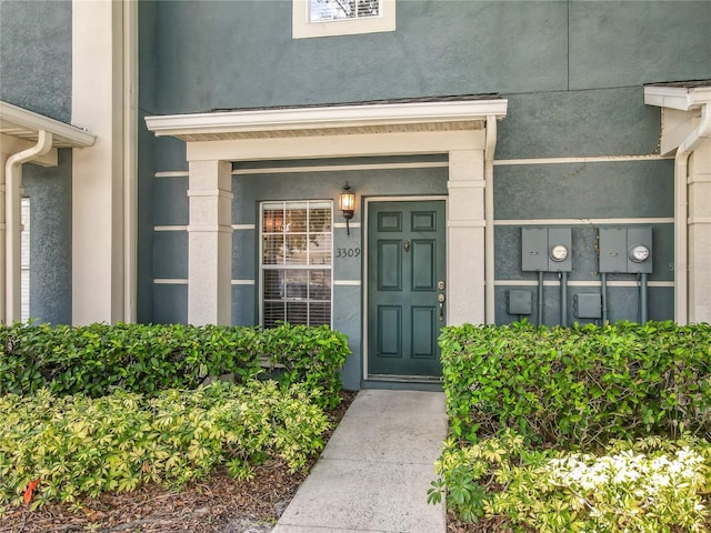 3309 Wilshire Way Rd Unit 3, Orlando, FL 32829 - view of exterior entry with stucco siding