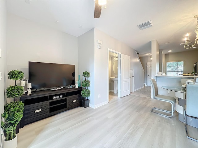 3309 Wilshire Way Rd Unit 3, Orlando, FL 32829 - office featuring wood finished floors, a chandelier, and a ceiling fan