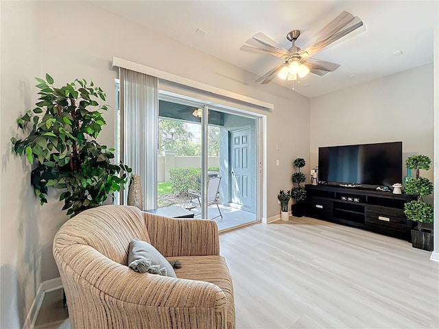 3309 Wilshire Way Rd Unit 3, Orlando, FL 32829 - living room with wood finished floors and a ceiling fan