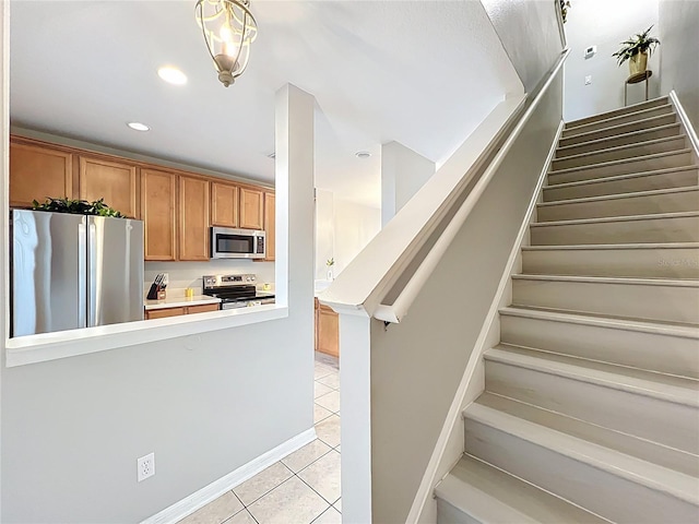 3309 Wilshire Way Rd Unit 3, Orlando, FL 32829 - staircase featuring tile patterned flooring and recessed lighting