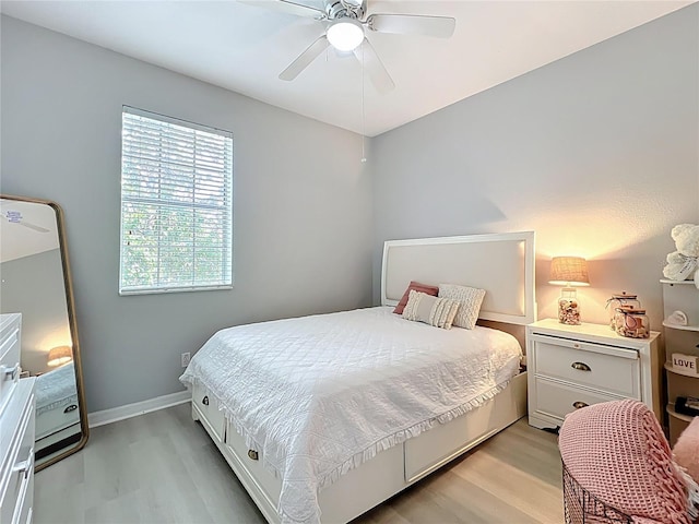 3309 Wilshire Way Rd Unit 3, Orlando, FL 32829 - bedroom with light wood-style flooring and a ceiling fan
