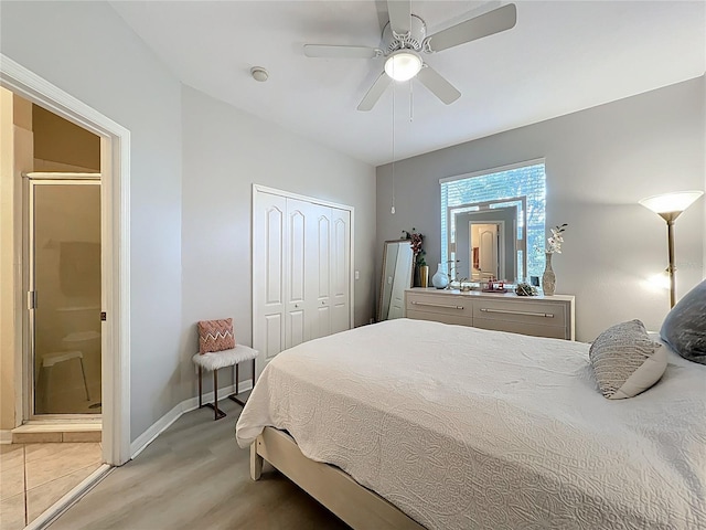 3309 Wilshire Way Rd Unit 3, Orlando, FL 32829 - bedroom with a closet, light wood-style flooring, ensuite bathroom, and a ceiling fan