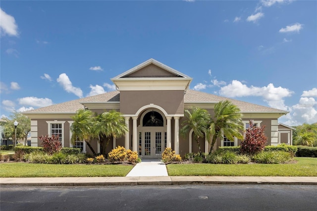 3309 Wilshire Way Rd Unit 3, Orlando, FL 32829 - mediterranean / spanish house with french doors, a front lawn, and stucco siding