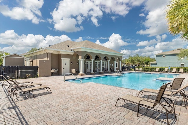 3309 Wilshire Way Rd Unit 3, Orlando, FL 32829 - community pool featuring french doors and a patio area