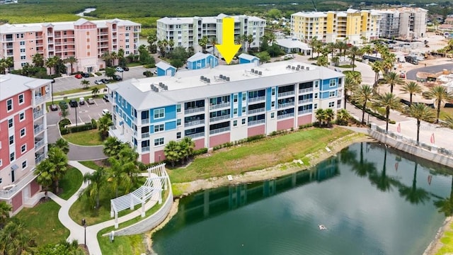 1 Riverwalk Dr Unit 303, New Smyrna Beach, FL 32169 - drone / aerial view of apartment complex and a large body of water