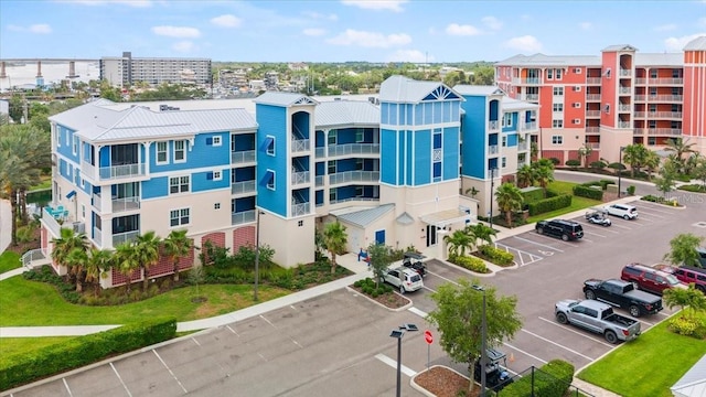 1 Riverwalk Dr Unit 303, New Smyrna Beach, FL 32169 - view of apartment building / complex with uncovered parking