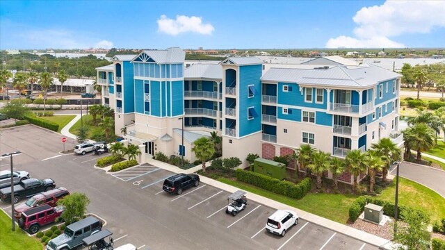 1 Riverwalk Dr Unit 303, New Smyrna Beach, FL 32169 - view of property with uncovered parking
