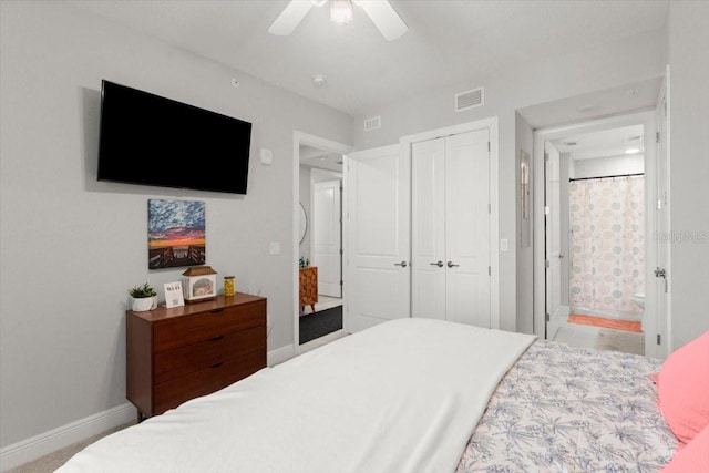 1 Riverwalk Dr Unit 303, New Smyrna Beach, FL 32169 - bedroom with baseboards, a closet, and a ceiling fan
