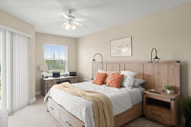 1 Riverwalk Dr Unit 303, New Smyrna Beach, FL 32169 - bedroom with light carpet, ceiling fan, and baseboards