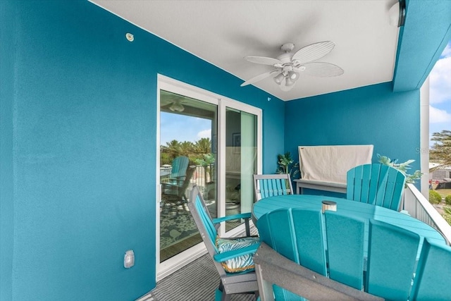 1 Riverwalk Dr Unit 303, New Smyrna Beach, FL 32169 - balcony featuring a ceiling fan and outdoor dining area