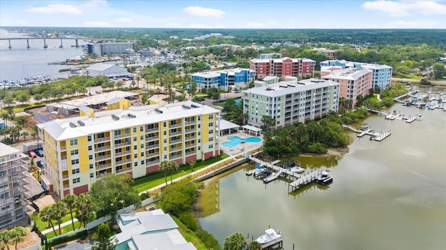 1 Riverwalk Dr Unit 303, New Smyrna Beach, FL 32169 - drone / aerial view of a large body of water, apartment complex / building, and numerous boat docks