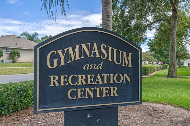 4571 Abaco Dr, Tavares, FL 32778 - community sign with a yard