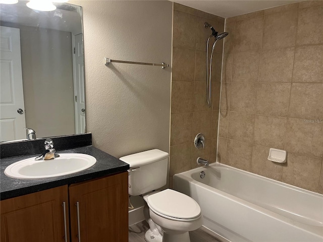 155 N Pearl Lake Cswy Unit 104, Altamonte Springs, FL 32714 - bathroom featuring vanity, toilet, shower / bath combination, and a textured wall
