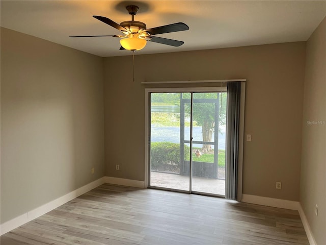 155 N Pearl Lake Cswy Unit 104, Altamonte Springs, FL 32714 - unfurnished room with light wood-style floors, ceiling fan, and baseboards