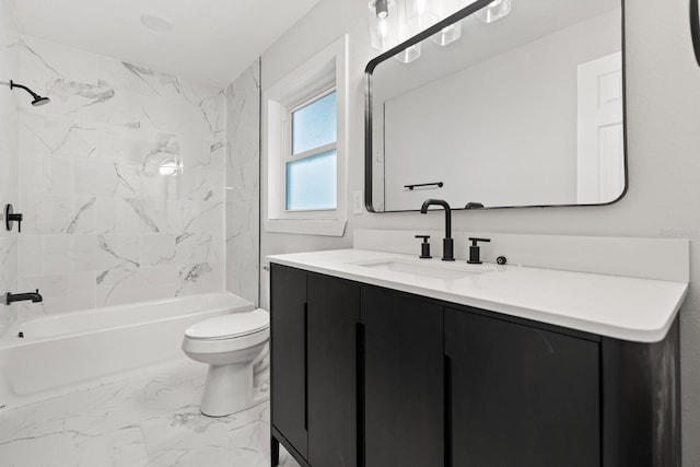 612 Florida Ave, Saint Cloud, FL 34769 - bathroom with marble finish floors, toilet, vanity, and  shower combination