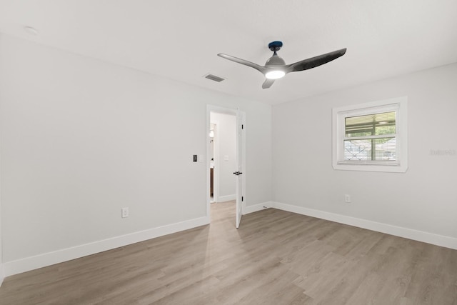 612 Florida Ave, Saint Cloud, FL 34769 - unfurnished room with light wood-style floors, baseboards, and a ceiling fan