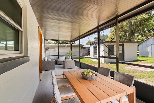 612 Florida Ave, Saint Cloud, FL 34769 - sunroom / solarium featuring healthy amount of natural light, outdoor dining space, and an outdoor hangout area