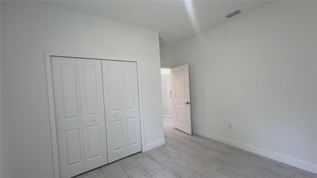 3315 W Montgomery Ln, Citrus Springs, FL 34433 - unfurnished bedroom with a closet and baseboards