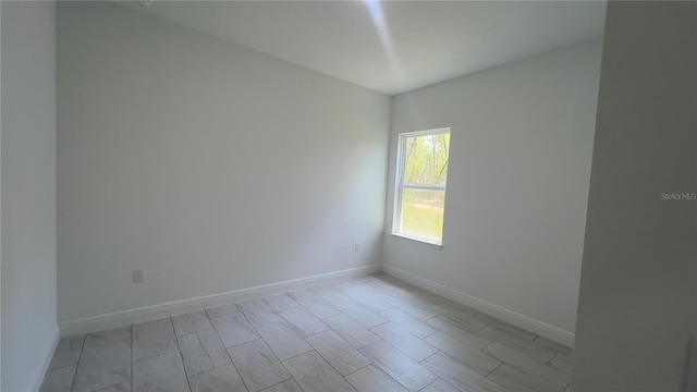 3315 W Montgomery Ln, Citrus Springs, FL 34433 - spare room with baseboards