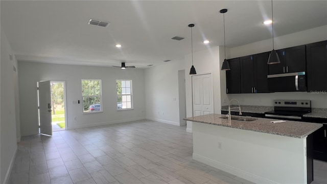 3315 W Montgomery Ln, Citrus Springs, FL 34433 - kitchen featuring a sink, stainless steel appliances, dark cabinets, a ceiling fan, and recessed lighting
