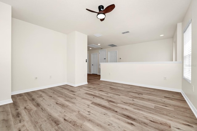 309 Black Springs Ln, Winter Garden, FL 34787 - empty room with ceiling fan, wood finished floors, plenty of natural light, and recessed lighting