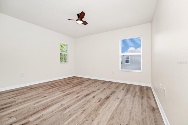 309 Black Springs Ln, Winter Garden, FL 34787 - spare room featuring light wood finished floors, baseboards, and a ceiling fan