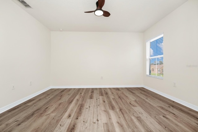 309 Black Springs Ln, Winter Garden, FL 34787 - spare room with wood finished floors, baseboards, and ceiling fan