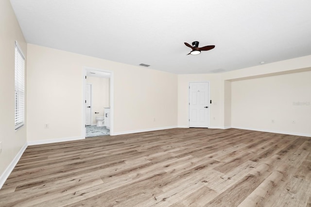 309 Black Springs Ln, Winter Garden, FL 34787 - spare room with light wood-type flooring, baseboards, and ceiling fan