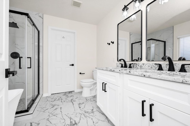 309 Black Springs Ln, Winter Garden, FL 34787 - full bathroom with marble look tile flooring, a marble finish shower, toilet, and double vanity