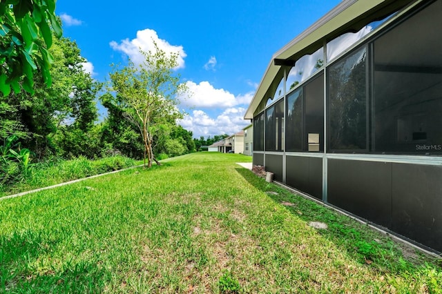 309 Black Springs Ln, Winter Garden, FL 34787 - view of grassy yard with a sunroom