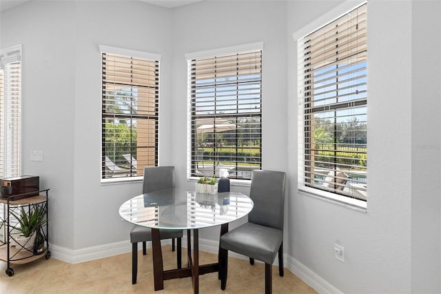 8312 Prestbury Dr, Orlando, FL 32832 - dining space featuring healthy amount of natural light, baseboards, and tile patterned flooring