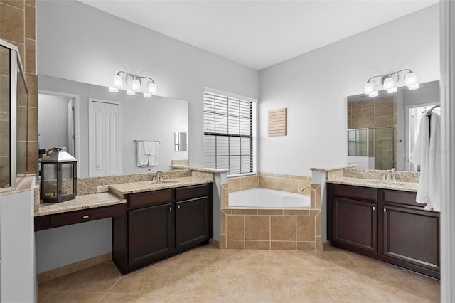 8312 Prestbury Dr, Orlando, FL 32832 - full bathroom with a stall shower, a garden tub, tile patterned floors, and two vanities